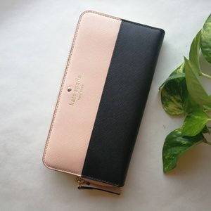 Kate Spade zipper wallet in pink and black